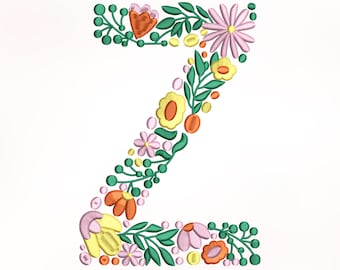 Può includere: Una lettera Z floreale ricamata, con fiori in tonalità di rosa, giallo, arancione e verde.