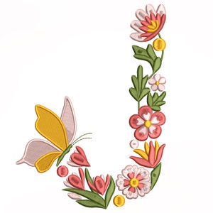 May include: Embroidered floral letter J with a yellow and pink butterfly. The letter is formed by a vine with pink, red, and yellow flowers.