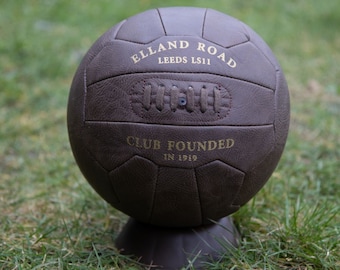 Leeds old fashioned style display football with stand. ELLAND ROAD LS11. Fantastic gift for football fans.