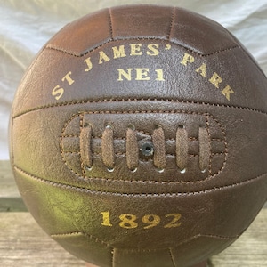 Newcastle United old fashioned style display football with optional stand. ST JAMES&#39; PARK NE1