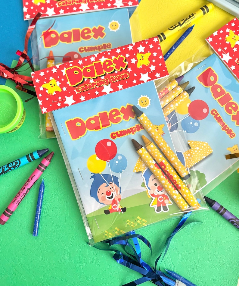 May include: A clear plastic bag filled with colouring books and crayons. The colouring books feature a cartoon character named "Palex" and the text "Palex Cumple". The crayons are red, yellow, blue, and brown.