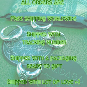May include: A close-up of silver rings and a silver hoop earring on a green background with the text "ALL ORDERS ARE FREE SHIPPING WORLDWIDE SHIPPED WITH TRACKING NUMBER SHIPPED WITH A PACKAGING READY TO GIFT SHIPPED WITH LOT OF LOVE :-) :-) www."