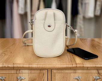 Bolso/estuche para teléfono de piel color crema tipo bandolera