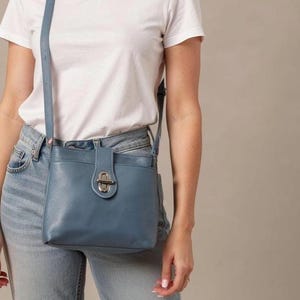 Blue Leather Toggle Cross body Bag.