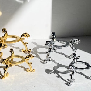 Metallic Sphere Stand: Gold & Silver Crystal Display