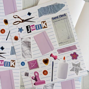 May include: A collage of stickers and stationery items on lined paper. Includes the word "junk" in colorful letters, pink notebooks, scissors, buttons, and a "Guest Check" sticker. Other stickers include stars, hearts, and a stamp.