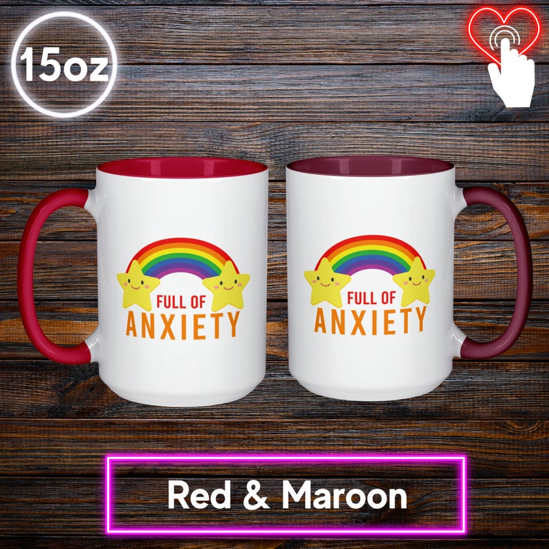 May include: Two white 15oz mugs with red handles and maroon interiors. Each mug features a rainbow, two smiling stars, and the text "FULL OF ANXIETY" in orange. The mugs are labeled "Red & Maroon" at the bottom.