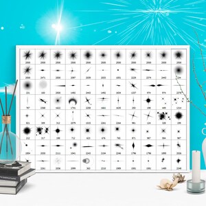 K&ouml;nnte beinhalten: Ein schwarzes und wei&szlig;es Blatt mit 100 verschiedenen Sternenausbr&uuml;chen und Glitzereffekten. Das Blatt liegt auf einer wei&szlig;en Oberfl&auml;che mit einer Vase, einer Kerze und einem Stapel B&uuml;chern.