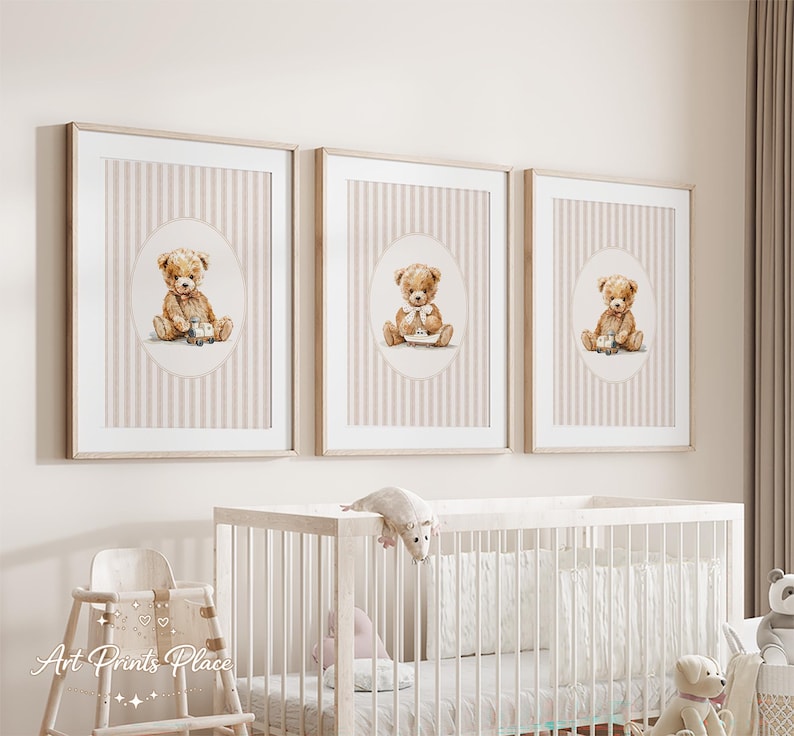 May include: Three framed prints featuring watercolor teddy bear illustrations. Each print has a beige and white striped background with an oval frame. The teddy bears are depicted in various poses, holding toys and wearing bows.