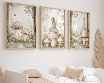 May include: Three framed watercolour prints showcasing whimsical forest scenes. The prints depict mushrooms, fairies, and woodland paths in soft pastel colours. The frames are a light wood tone, creating a gentle and dreamy aesthetic.
