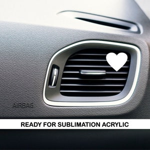 May include: White heart-shaped sticker on a black car air vent.  Ready for sublimation acrylic.
