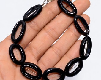 Black Onyx Oval Bead Bracelet: Smooth Go-Go Style, 9 Inch