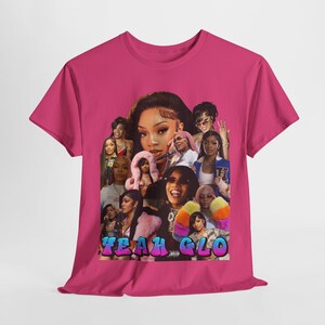 Puede incluir: Una camiseta magenta con un collage de imágenes de mujeres y el texto "YEAH GLO" en una fuente colorida y estilizada. Las imágenes incluyen varios retratos y poses de las mujeres.