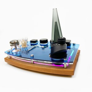 The Puffco Get Lit Programmable RGB LED Dab Rig Station Tray for Peak or Pro, Hot Knife, With Transparent Top and ISO Pump, Q-Tip Swab Jar