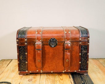 Wooden treasure chest covered with leather