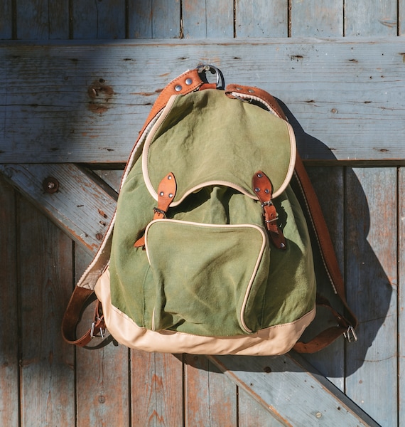 Old hiking backpack green