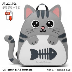 May include: A gray cat-shaped backpack with a white belly and a dark gray fishbone design. The backpack has a handle, adjustable straps, and a tail. The text "Echo Pic #006-12" and "Echopic Patterns" are visible.