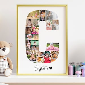 May include: A gold framed print with a white background featuring a collage of photos of babies arranged in the shape of the letter C. The name "Crystalle" is written below the letter with a heart symbol.