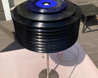 Vinyl record table lamp. Upcycled 33 rpm/45 rpm/10” vinyl record touch sensor switch, one of a kind table lamp.