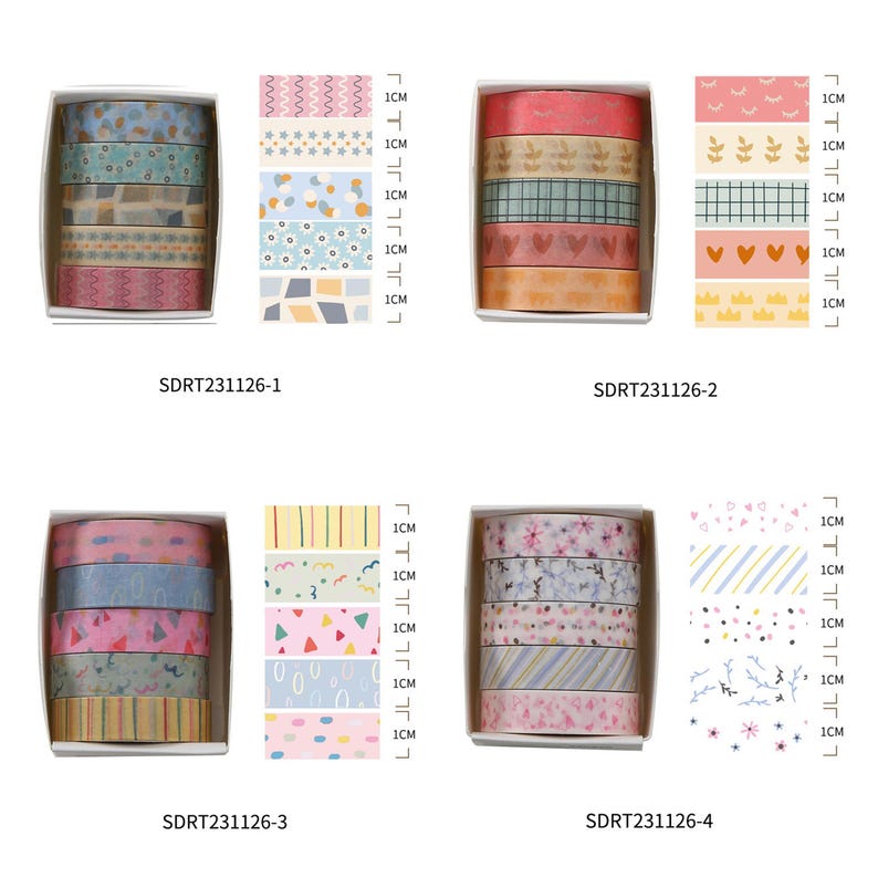 May include: Four sets of colorful washi tape rolls in clear plastic boxes. Each set includes five rolls of tape with different patterns. The tape is 1 cm wide. The sets are labeled with the product code: SDRT231126-1, SDRT231126-2, SDRT231126-3, and SDRT231126-4.