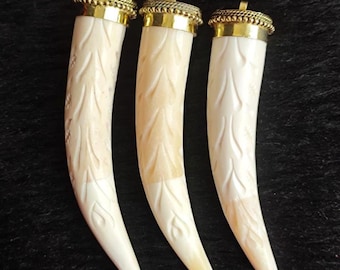 Carved Bone Tusk Pendant: Ethically Sourced Buffalo Horn, Tribal Brass Cape