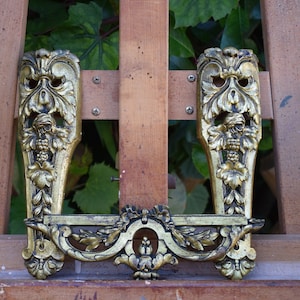Set of three bronze Pediment decorations for furniture