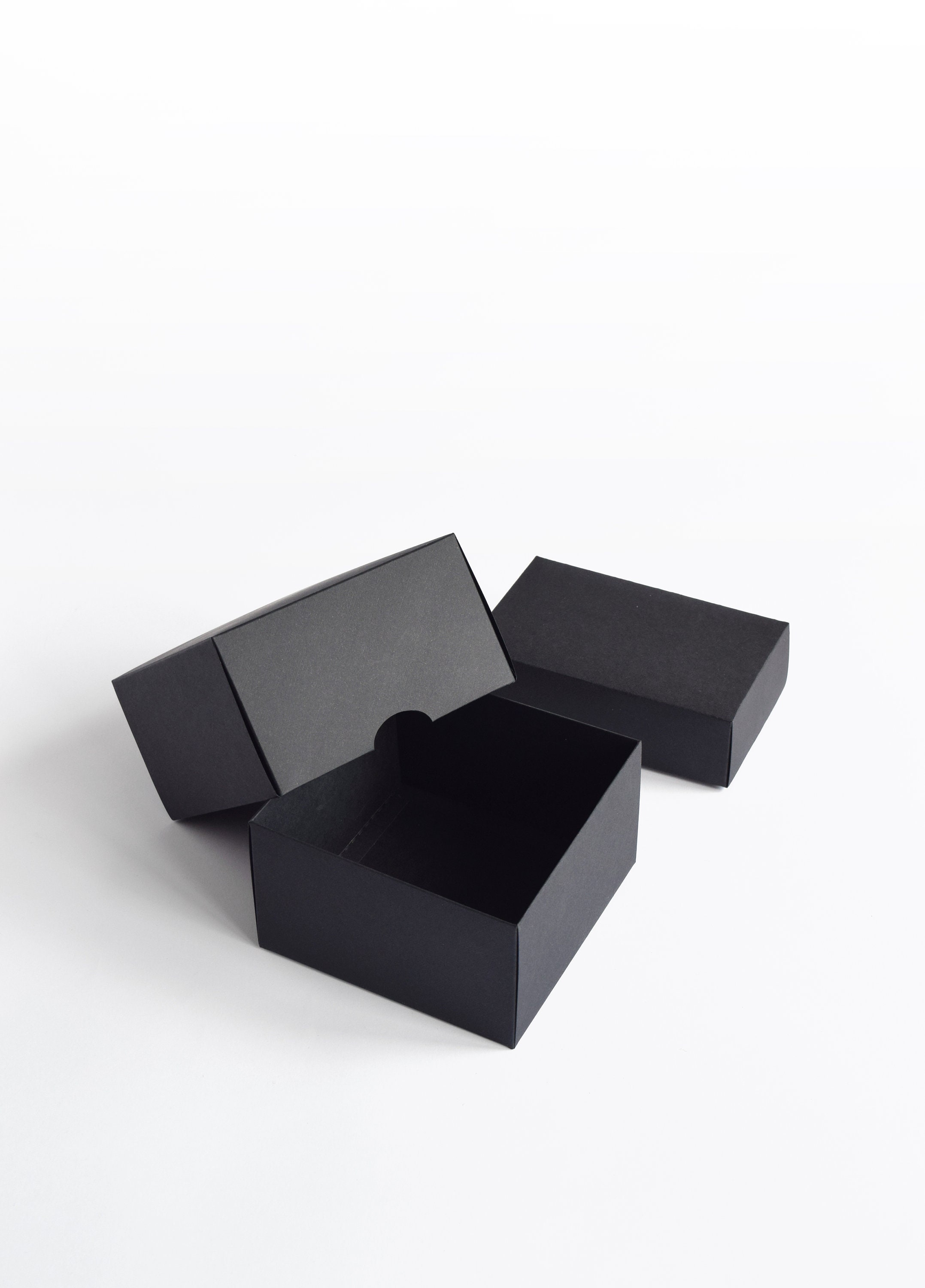 BLACK Storage Box for # 7 Glassine Envelopes., 14-1/4 x 7 x 4-3/4., Made  from .040 thick chipboard. , Wrapped in embossed black paper. 2