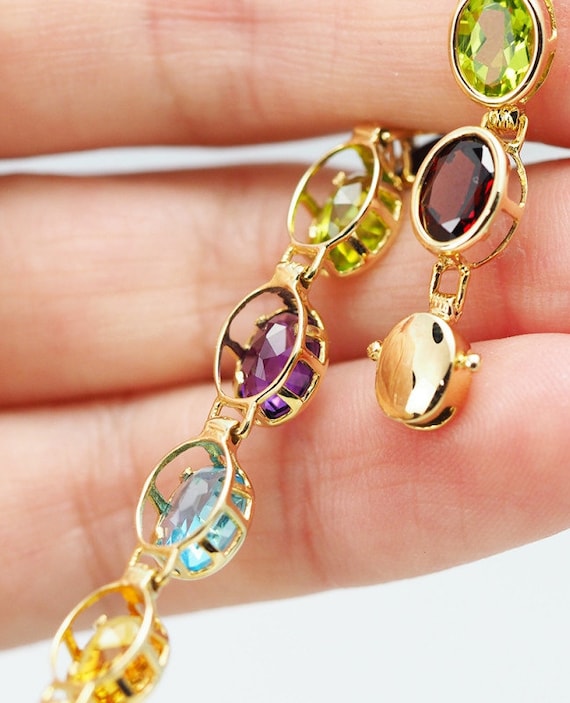 Yellow Gold Bracelet . 17 Assorted Gemstones . Gol