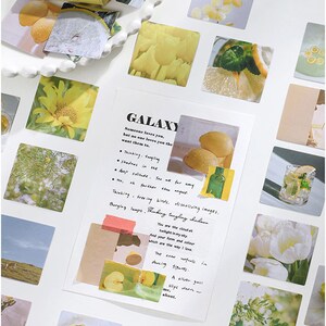 May include: A set of colorful stickers featuring various images, including lemons, sunflowers, clouds, and flowers. The stickers are printed on white paper and have a matte finish. The text on the stickers reads "GALAXY" and "Someone loves you, but no one loves you the want them to."