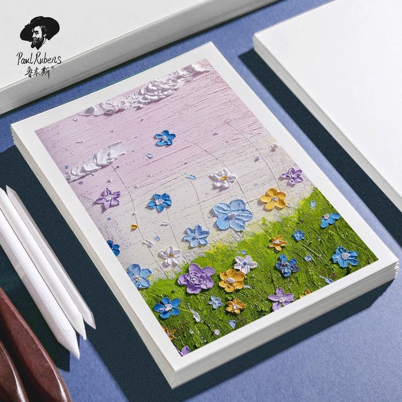 May include: A painting depicting a field of flowers in shades of blue, purple, yellow, and white. The flowers are painted in a textured style, giving the impression of brushstrokes. The background is a soft pink with white clouds.