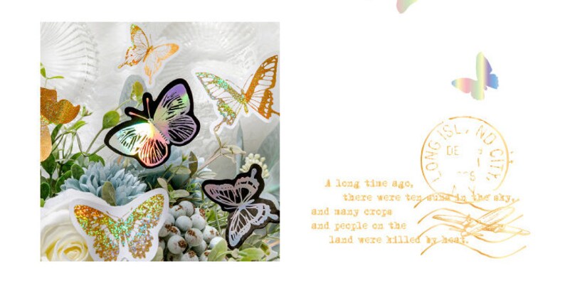 May include: A bouquet of flowers with iridescent butterfly stickers. The butterflies are in various colours and designs, including gold, silver, and rainbow.