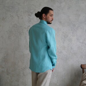 Men's Point Collar Linen Shirt, Natural Buttons and Long Sleeves, side view showing a turquoise linen shirt.