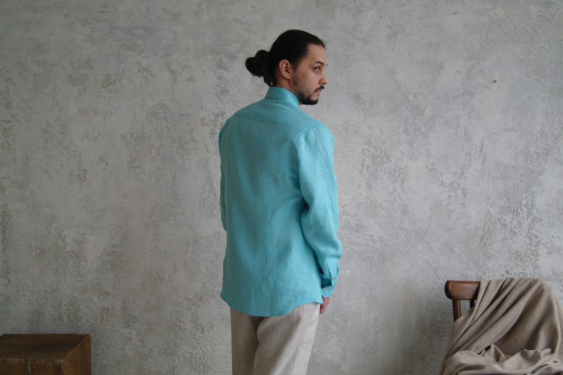 Men's Point Collar Linen Shirt, Natural Buttons and Long Sleeves, side view showing a turquoise linen shirt.