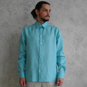 Men's Point Collar Linen Shirt, Natural Buttons and Long Sleeves, front view showing a turquoise long-sleeve linen button-down shirt.