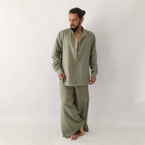 May include: A light green linen shirt and matching wide-leg pants. The long-sleeved shirt has a mandarin collar and a button-down front. The pants are loose-fitting. The outfit is made of a lightweight fabric, suitable for warm weather.
