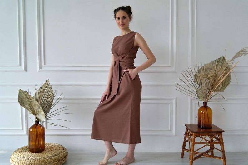 Women's kimono linen dress showing long waist ties and relaxed straight silhouette