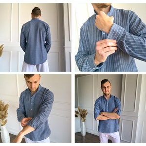 May include: Blue and white striped long-sleeve shirt with a mandarin collar. The shirt is shown from multiple angles, including the back and close-ups of the sleeves. The sleeves can be rolled up. The shirt is paired with white pants.