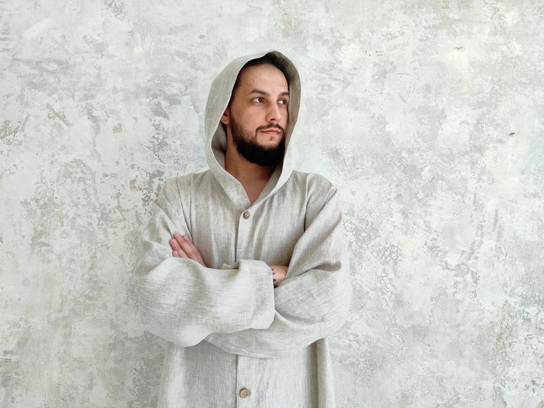 Men's Undyed Hooded Linen Kaftan with Button Front Side Slits and Deep Pockets, front view showing an undyed, hooded linen kaftan.