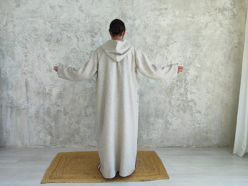 Men's Undyed Hooded Linen Kaftan with Button Front Side Slits and Deep Pockets, back view showing overall shape, construction and linen drape.