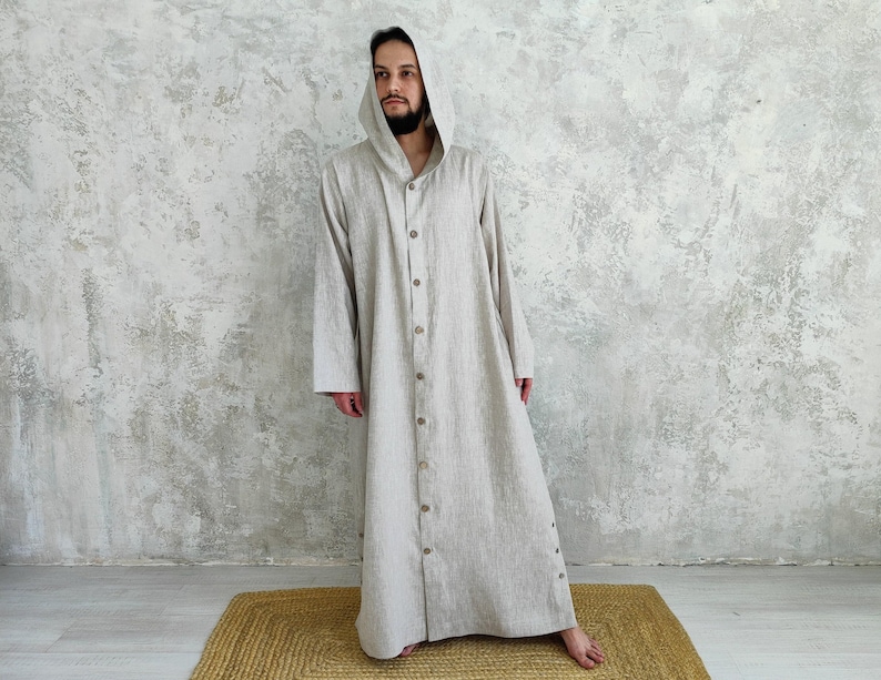 Men's Undyed Hooded Linen Kaftan with Button Front Side Slits and Deep Pockets, front view showing an undyed, hooded linen kaftan with a button-down front.