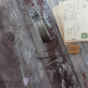 Herringbone Deluxe Black & Silver | Narrow Decorative Chevron Pattern Ribbon in Black and Silver