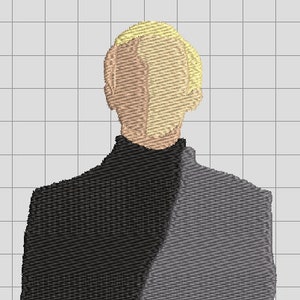 May include: A black and gray patterned shirt with a high collar. The person in the shirt has short, blonde hair.