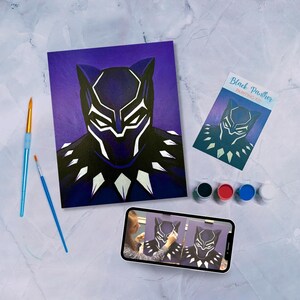 May include: Black Panther paint by numbers kit with a purple canvas, a close-up of the finished painting, and a photo of a person painting. The kit includes four paint pots, two paintbrushes, and a Black Panther painting kit instruction card.