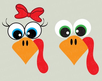 May include: Two turkey face cutouts, one with a red bow and blue eyes, the other with green eyes. Both have orange beaks and red wattles.
