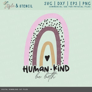 May include: A digital download cut file featuring a rainbow with black polka dots and a heart in the center. The text "HUMAN.KIND be both" is below the rainbow.