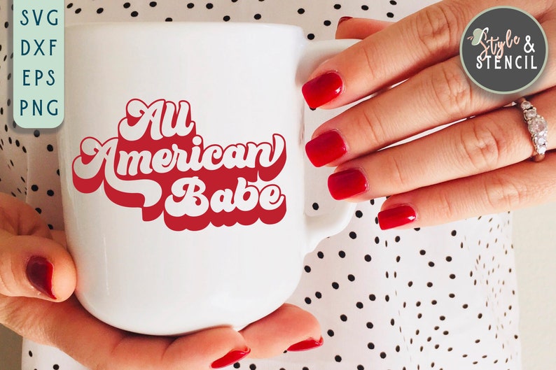 May include: White ceramic mug with a red retro-style graphic that says "All American Babe".