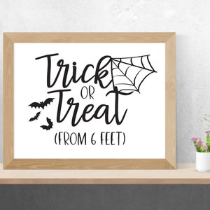May include: Black and white sign with the text "Trick or Treat (From 6 Feet)" with a spider web and bats.