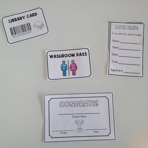 May include: A set of printable classroom passes, including a library card, washroom pass, late slip, and a congrats certificate. The passes are black and white with colorful accents.