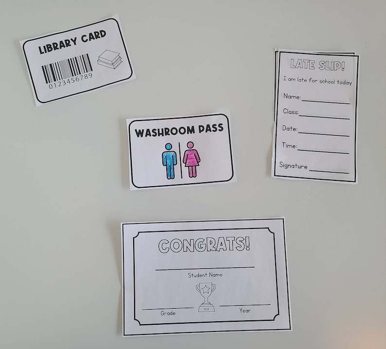 May include: A set of printable classroom passes, including a library card, washroom pass, late slip, and a congrats certificate. The passes are black and white with colorful accents.