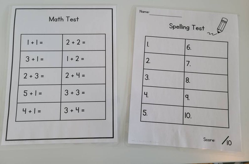 May include: Two black and white worksheets, one titled "Math Test" with simple addition problems and the other titled "Spelling Test" with numbered lines for writing words.
